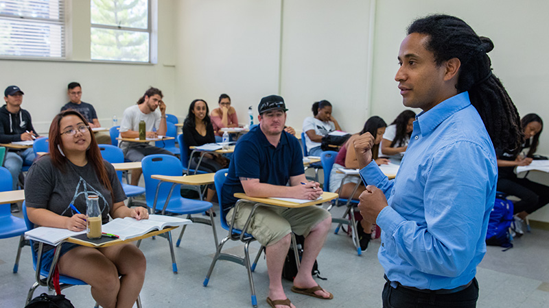 Indoor photo of instructor at classroom